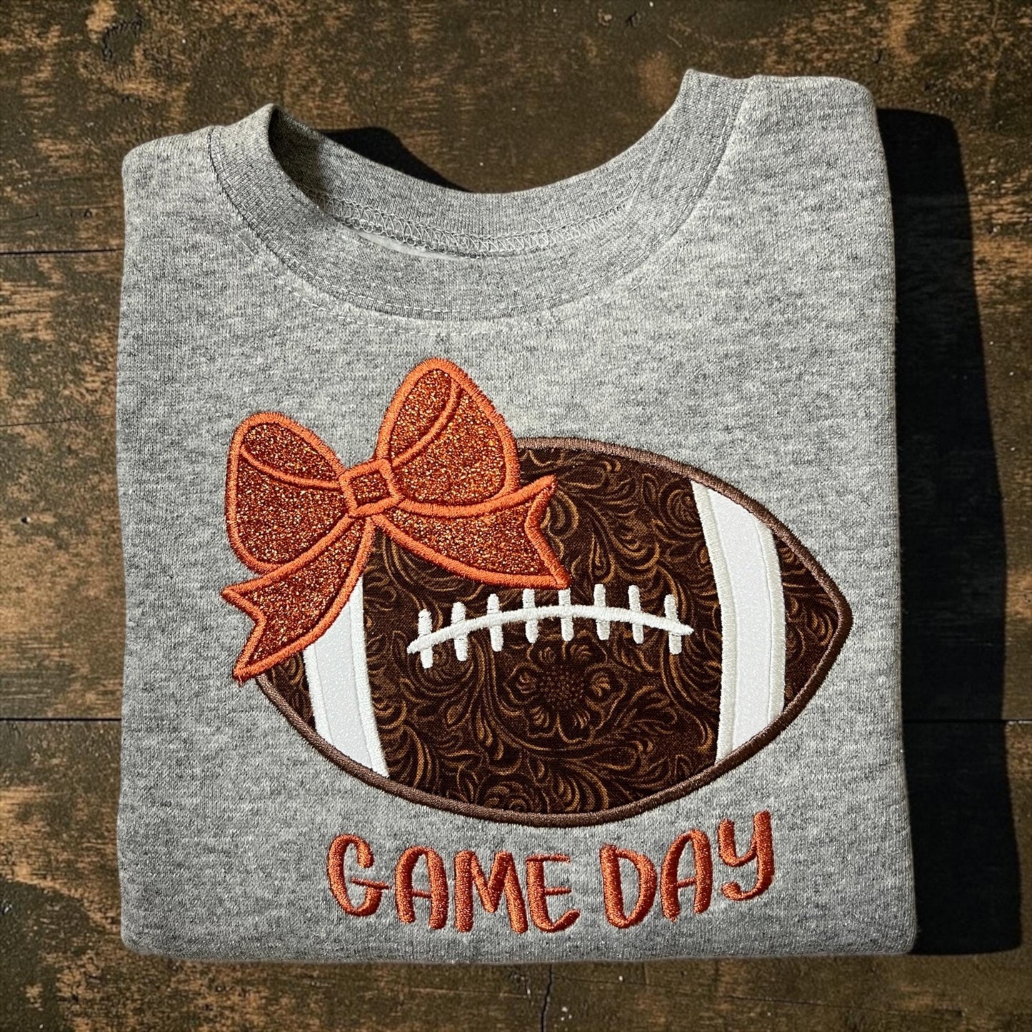 Girls Game Day Football with a Bow Embroidered Sweatshirt - personalization available.