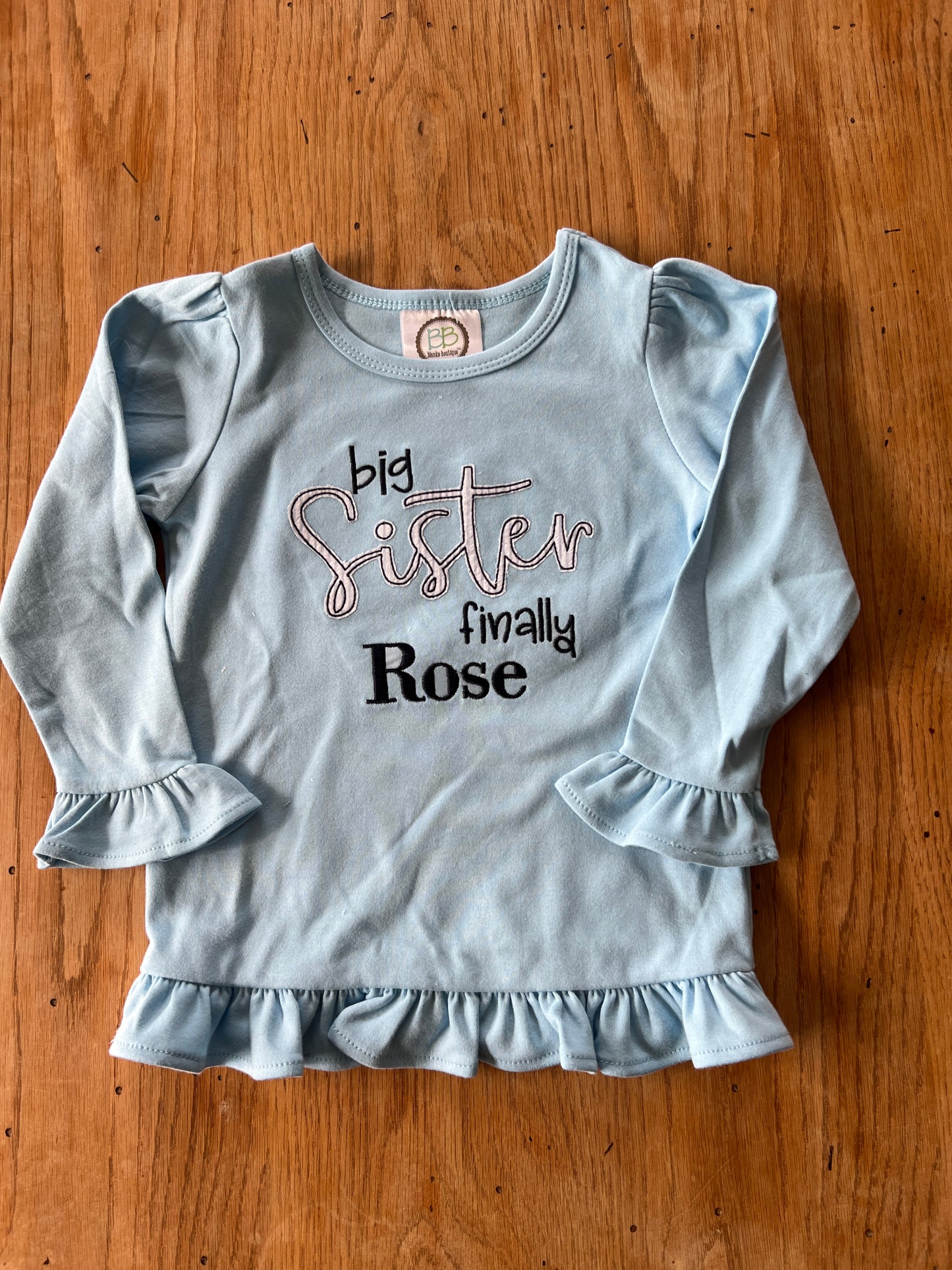 Big Sister Finally Embroidered long sleeve ruffle tee
