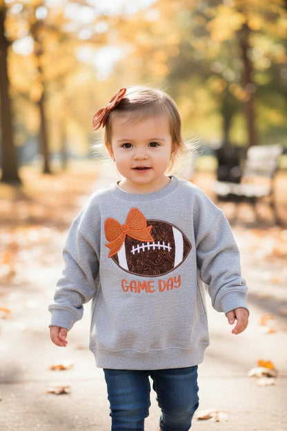 Girls Game Day Football with a Bow Embroidered Sweatshirt - personalization available.