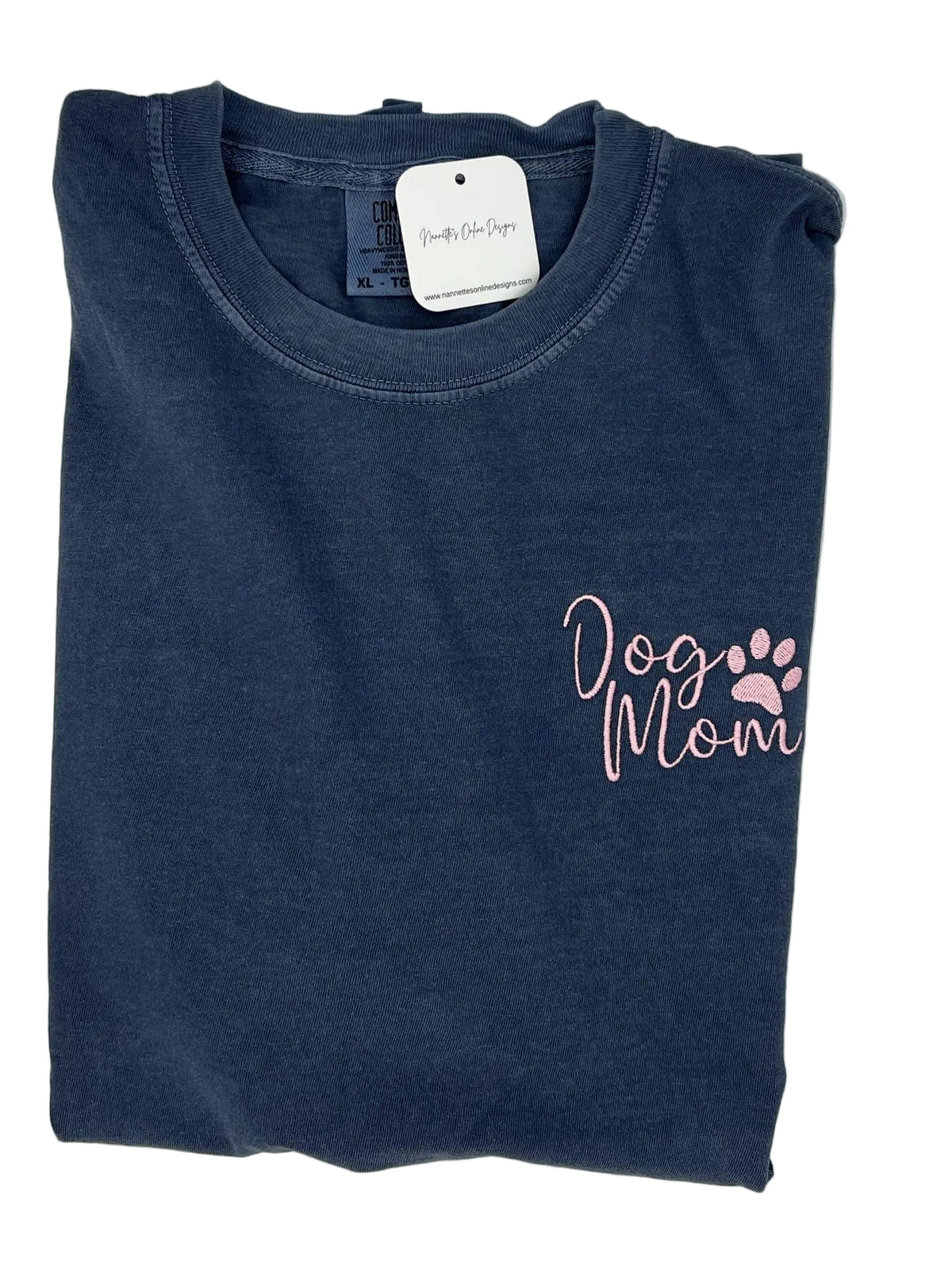 Nannette's Online Designs blue-grey garment-dyed cotton t-shirt with soft pink embroidered Dog Mom text and paw print.