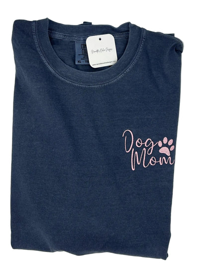 Nannette's Online Designs blue-grey garment-dyed cotton t-shirt with soft pink embroidered Dog Mom text and paw print.