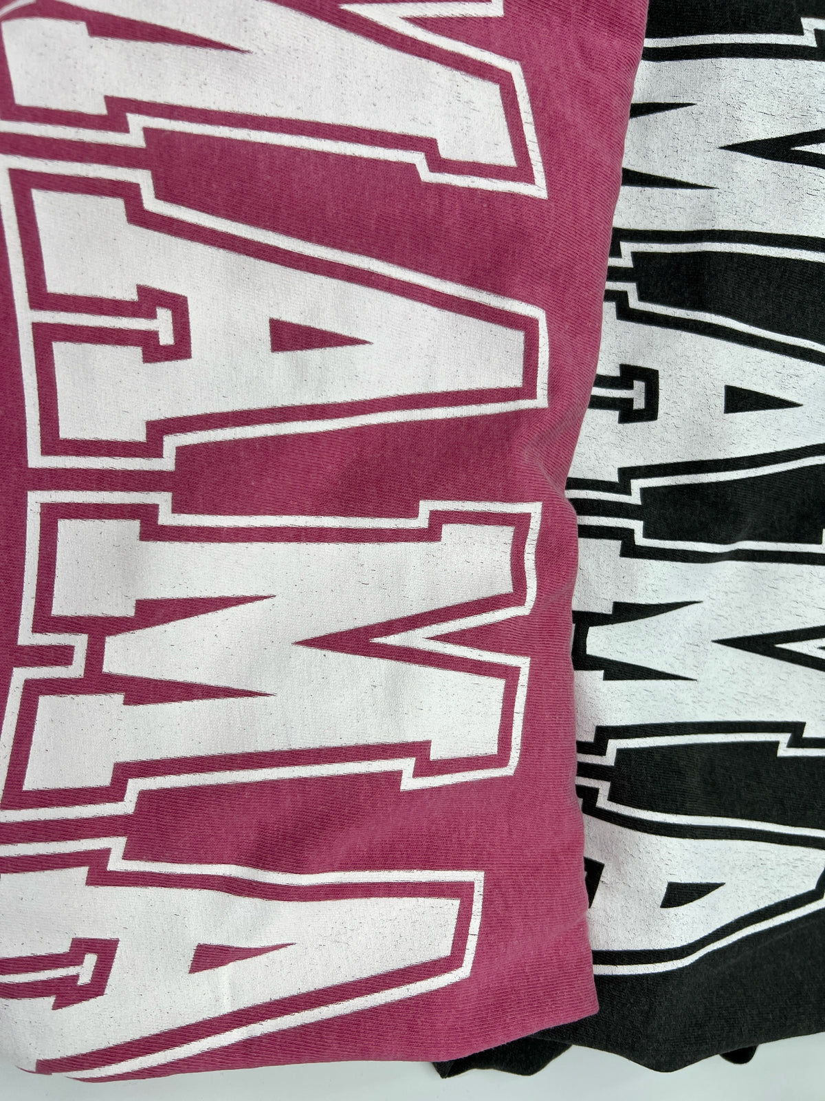 Nannette's Online Designs Mama graphic crewneck t-shirts in maroon and black with white collegiate-style lettering.