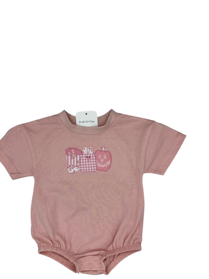 Nannette's Online Designs pink infant bubble romper with a festive BOO applique featuring stripes and gingham patterns.