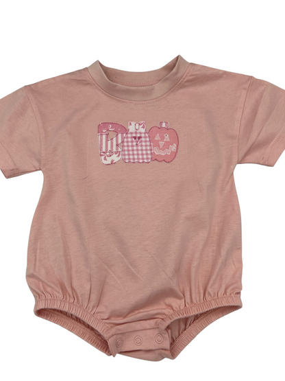 Nannette's Online Designs pastel pink infant bubble romper featuring a BOO applique with gingham and striped patterns.