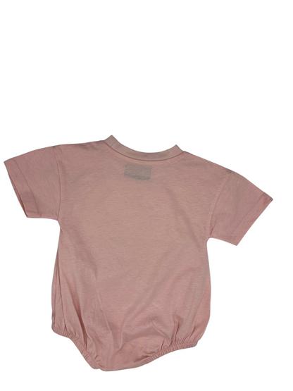 Back view of a Nannette's Online Designs pastel pink infant bubble romper with short sleeves and elasticized legs.