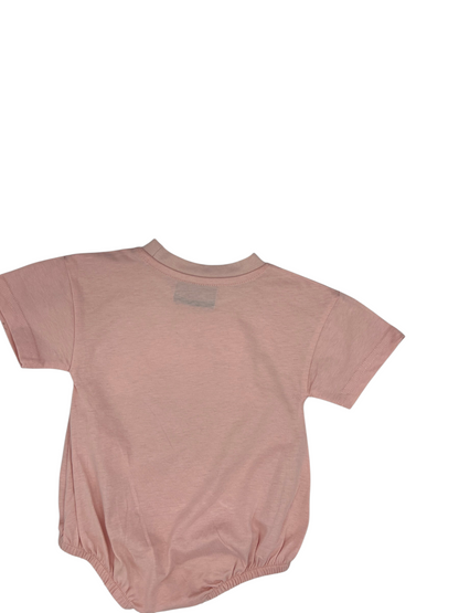 Back view of a Nannette's Online Designs pastel pink infant bubble romper with elasticized leg openings.