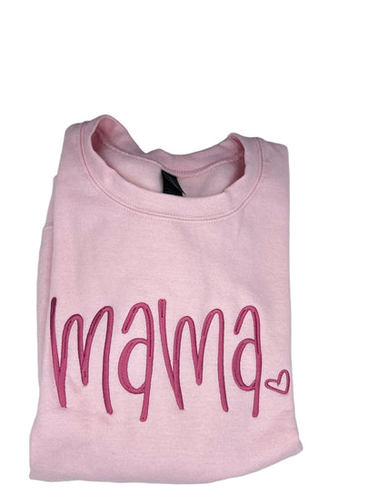 Nannette's Online Designs light pink crewneck sweatshirt with dark pink embroidered mama script and heart detail.