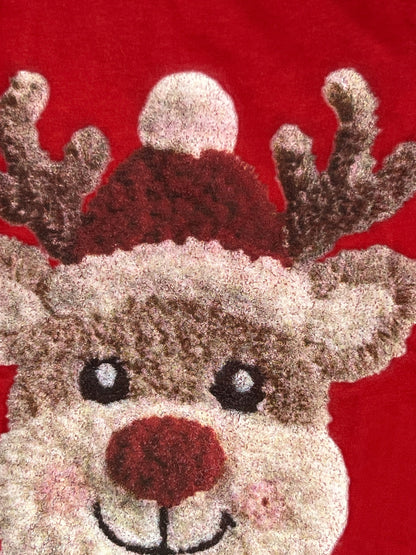 Nannette's Online Designs red holiday t-shirt featuring a textured reindeer graphic wearing a festive Santa hat