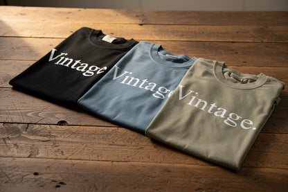 Nannette's Online Designs vintage graphic crewneck t-shirts in black, blue, and olive green heavyweight cotton.