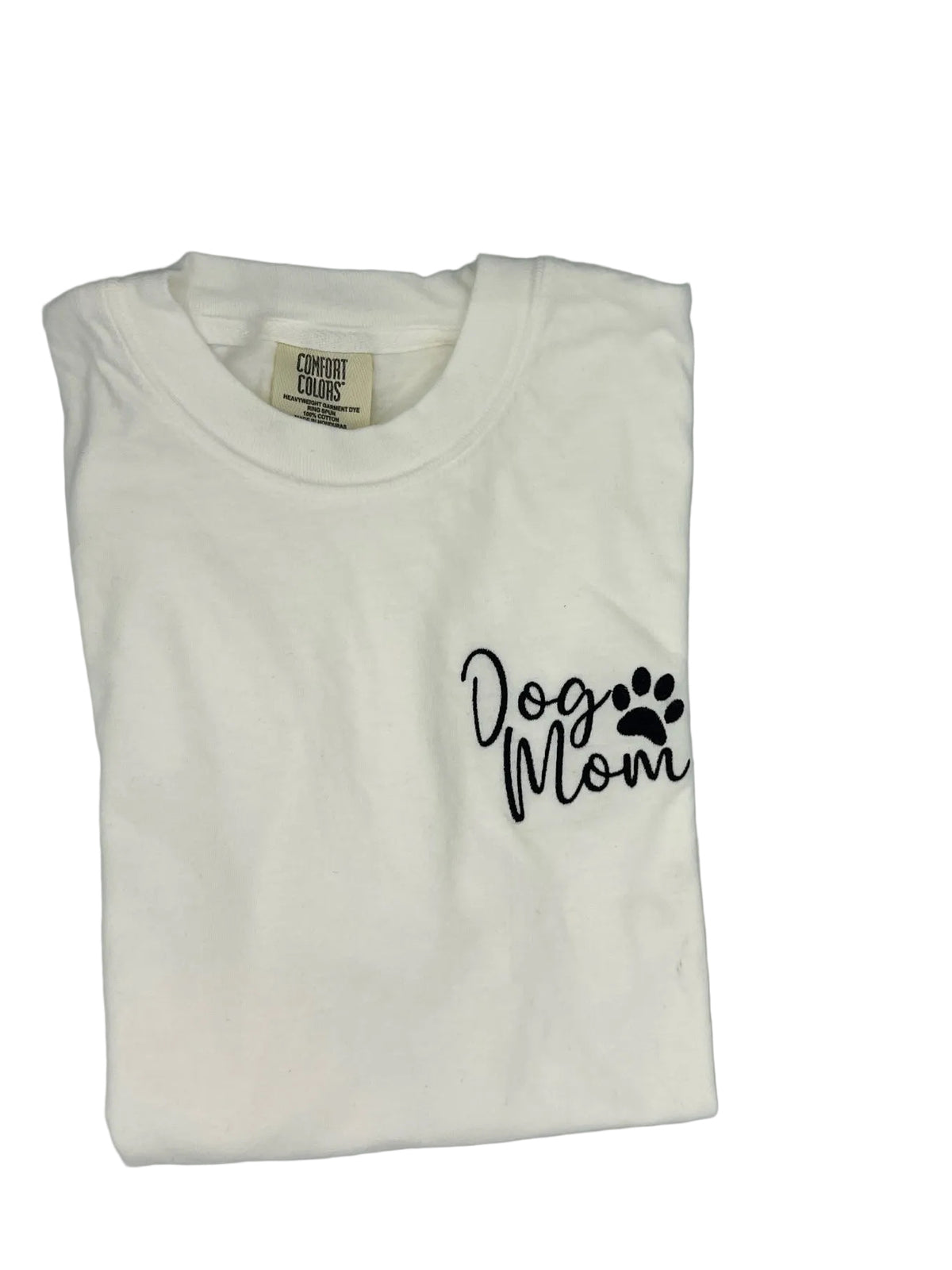 Nannette's Online Designs white garment-dyed cotton t-shirt with black embroidered Dog Mom text and paw print design