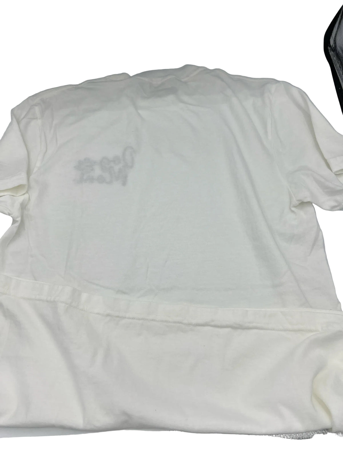 Nannette's Online Designs white cotton t-shirt with Dog Mom embroidery on the chest in a relaxed unisex fit